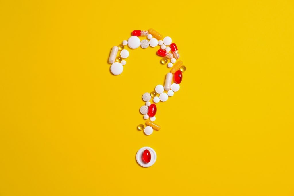 question mark made up of pills