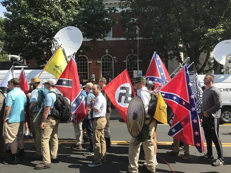 Alt-right members carry Nazi and Confederate Flags in Charlottesville hate rally