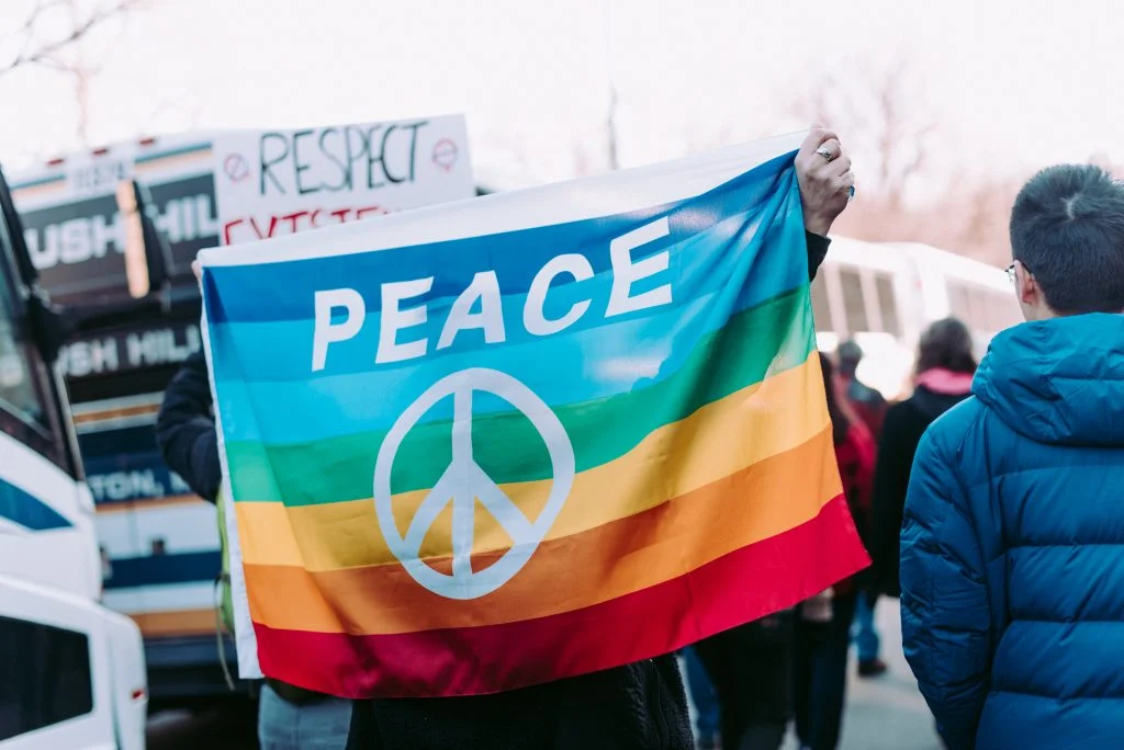 a flag with "peace" written on it
